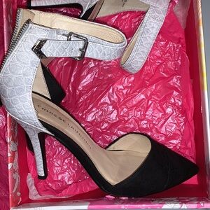 Fairly new pump snakeskin/suede design heel